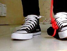 black sneaker cock trample