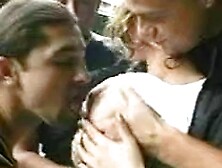 3 guys and girl in garage