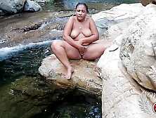 On a sex walk with my stepbrother and his friends, I show them outdoors, playing with my snatch and my boobs in the river. I am