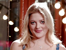 The hot blonde Jill Taylor shows off her juicy ass in a captivating backdrop