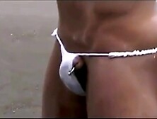 Muscled Asian Stud Bares Almost All at the Beach