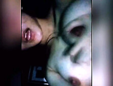 Iying in the room while squeezing breasts