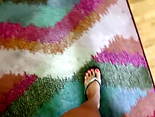 Beauty strips off her flip-flops and worships her sexy tattooed feet with red toe nails