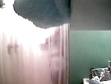 An Alluring Bimbo Caught On A Spy Cam In The Shower