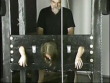 Old guy pounds young brunette with small tits jailed in stocks