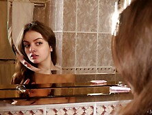 Sweet Brunette Gets Naked And Plays With Herself On A Red Bed