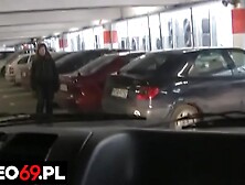 A high school whore gives a bj in car on the parking lot of a shopping mall