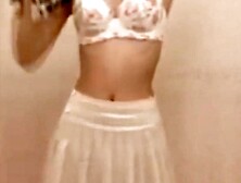 My wife trying on a sexy bra and panties.