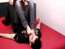 One as well as the other feet in his face