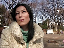 A nasty toy is handed over to a old woman with a gorgeous face and monitored,  and the appearance of swelling and feeling a ripe