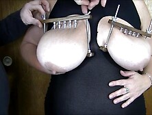 Chastity uses the SPIKED titty smashers!