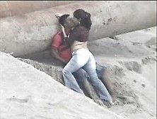 Latino Pair Caught On The Beach