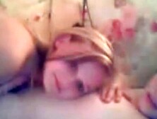 Hot teens kiss,  fondle and strip on webcam